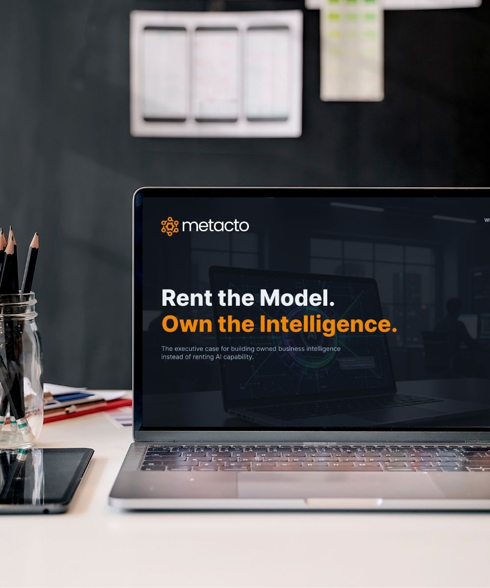 Rent the Model. Own the Intelligence. whitepaper shown on a tablet